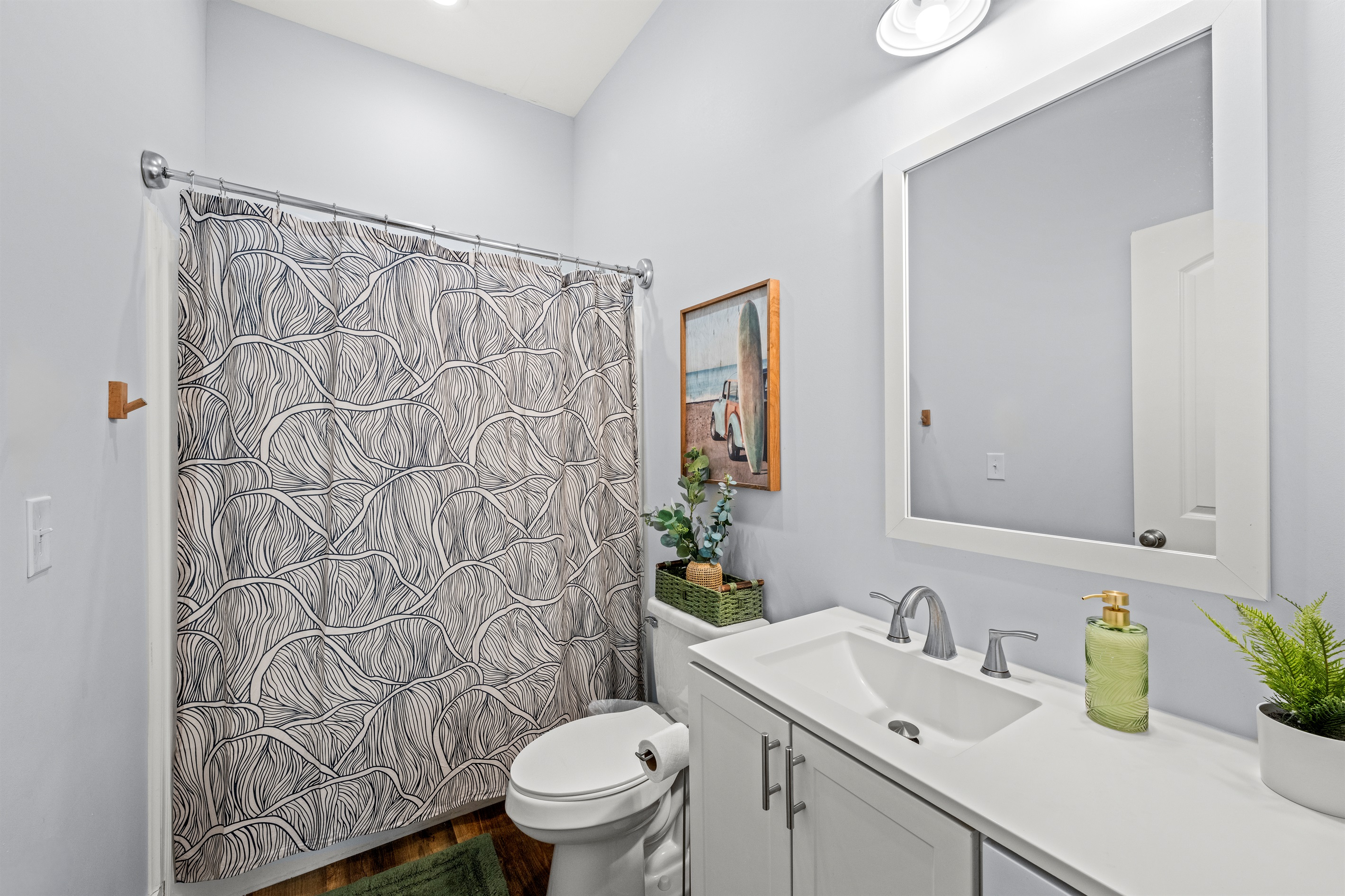 Clean, bright, and ready for relaxing after the beach. A spacious bathroom with everything you need during your Miramar Beach stay.