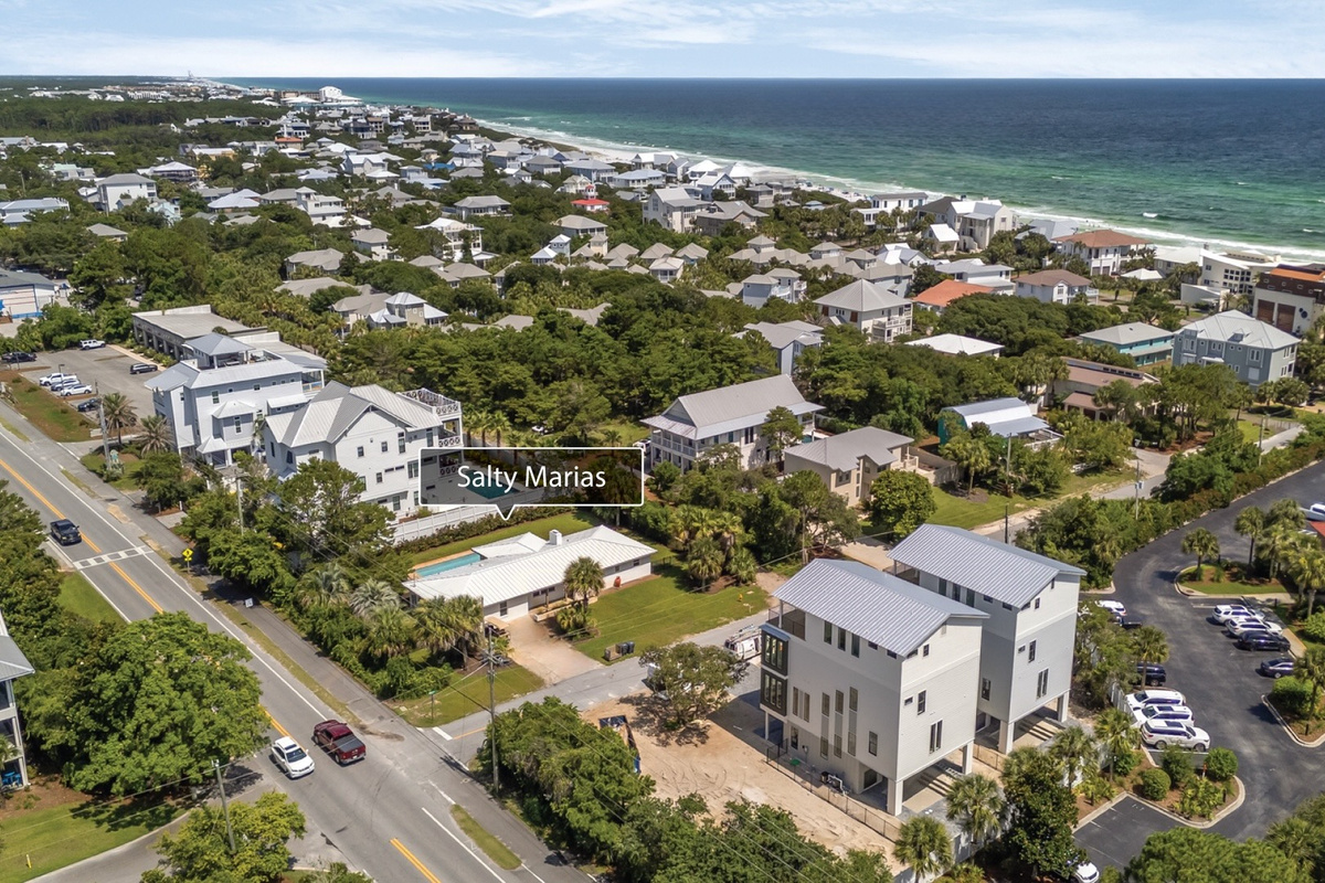 Private beach access keeps the sugar-white sands and emerald waters of 30A just moments from your escape.