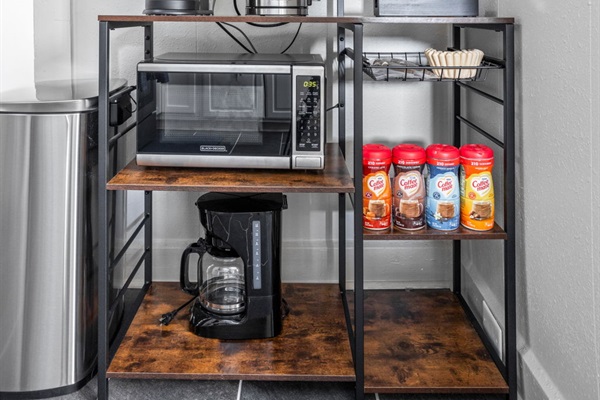 Wake up or relax with an assortment of coffee, tea and condiments.