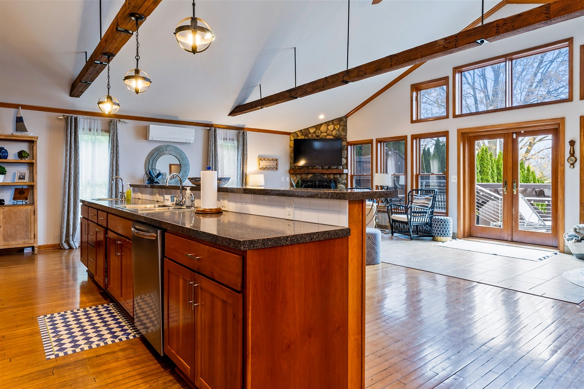 Open concept kitchen, dining and living space