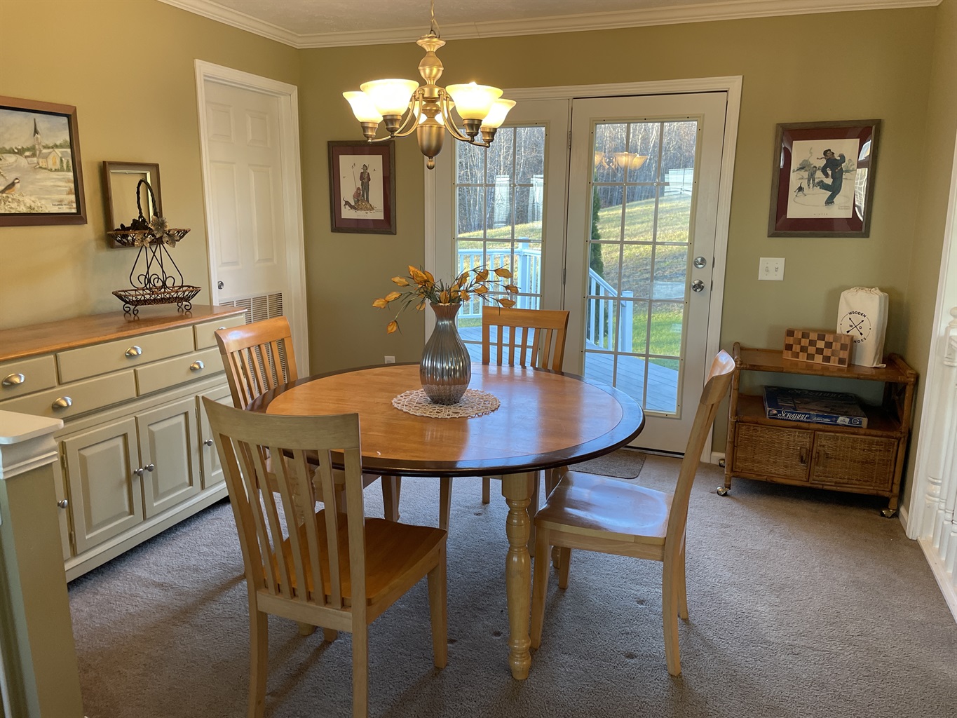 Dining area with rear deck beyond