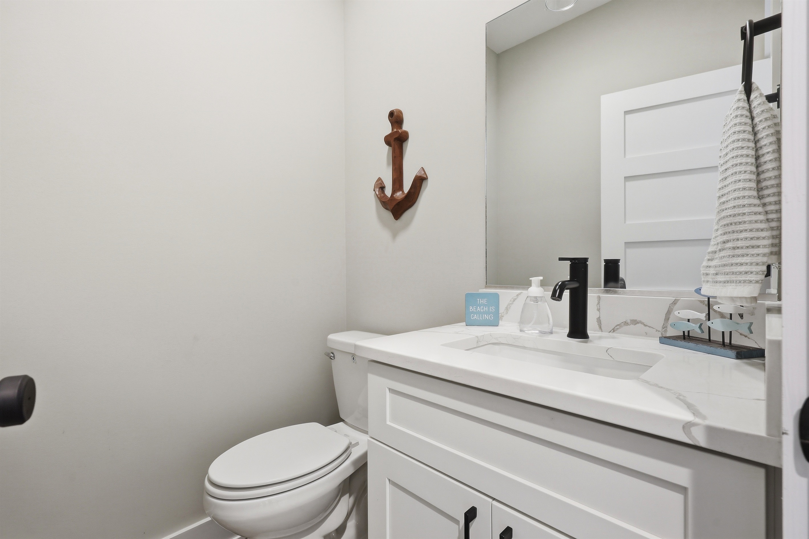 Convenient half bath on the main level