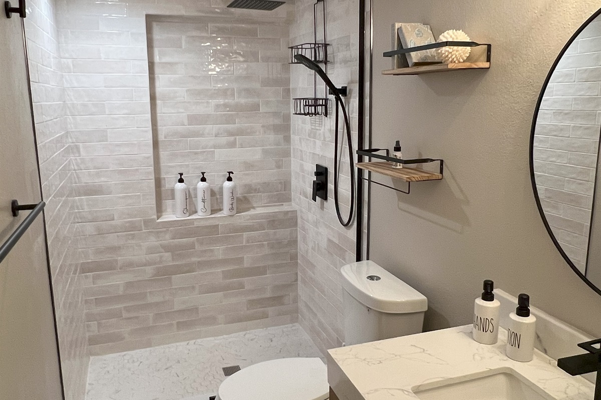 This bathroom is also on the main floor, just at the bottom of the stairs.