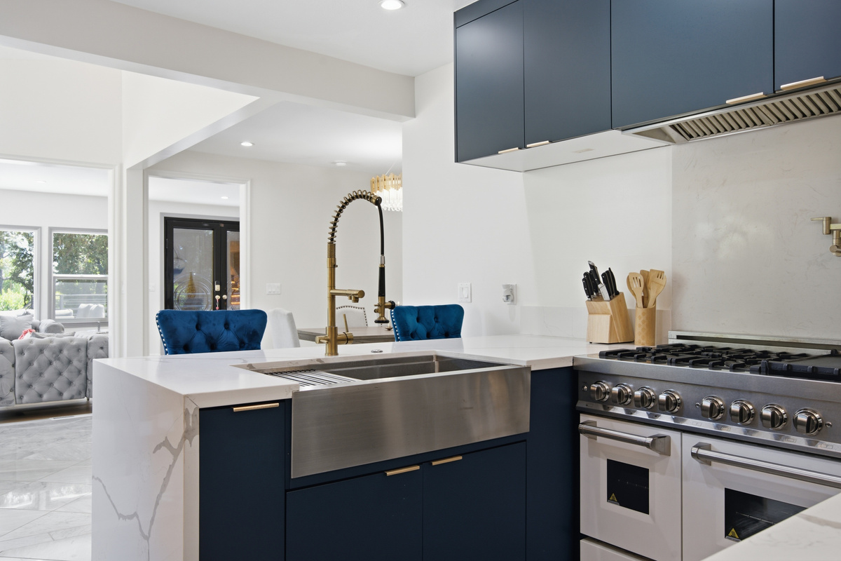A huge, beautifully designed kitchen with plenty of space to cook, gather, and create unforgettable vacation memories.