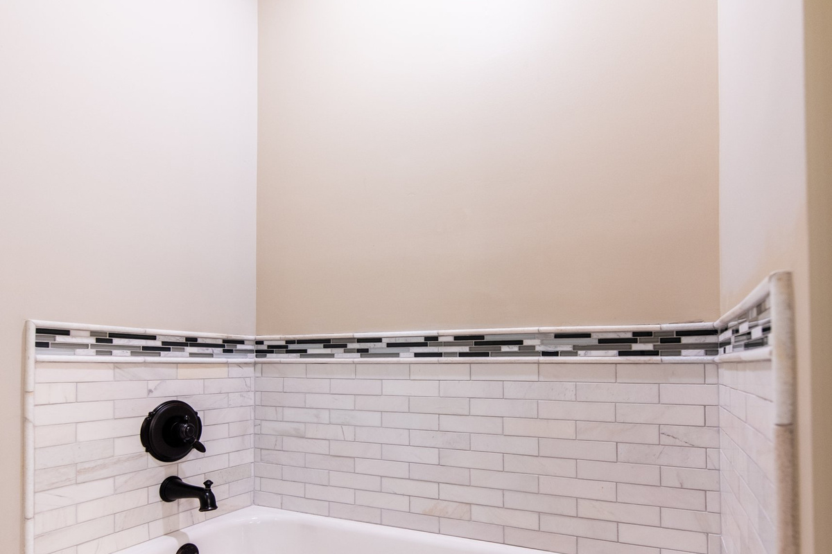 A deep soaking tub for unwinding after a day exploring Norton Commons.