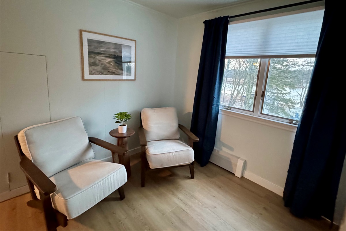 Cozy corner — curl up with a good book and a soft throw.