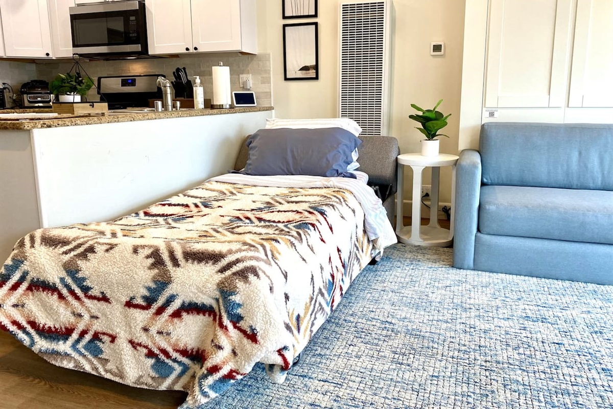 Sleeper ottoman opens to a twin bed