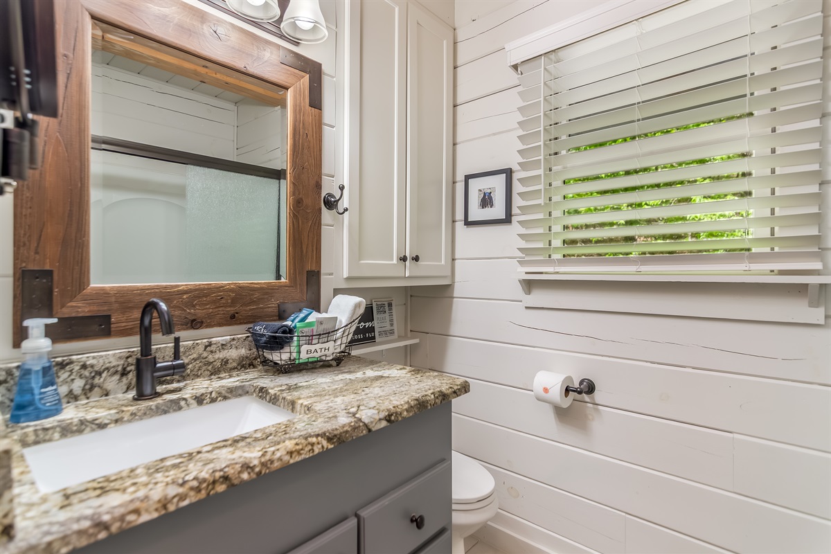 Even the views here are wonderful, as you have access to a full bath with a stand-up shower and a wonderful magnifying mirror.