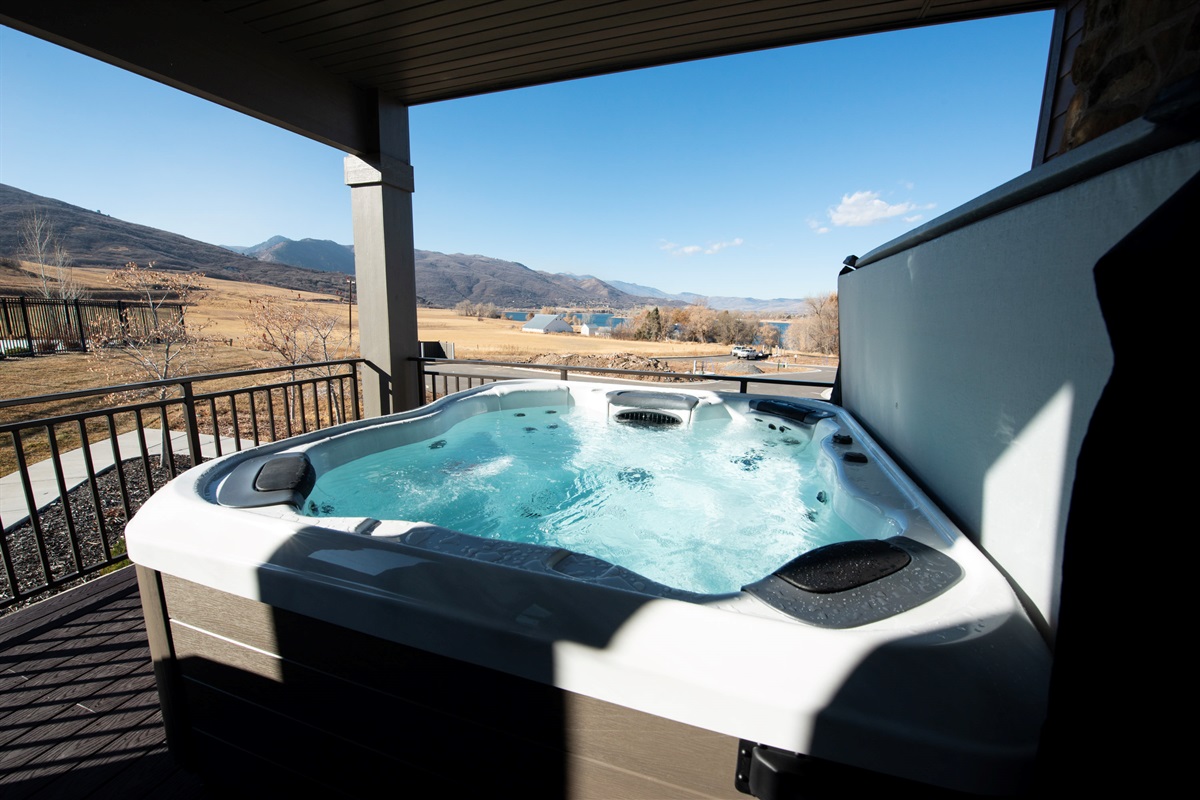 Relax in your private hot tub while taking in sweeping valley views.
