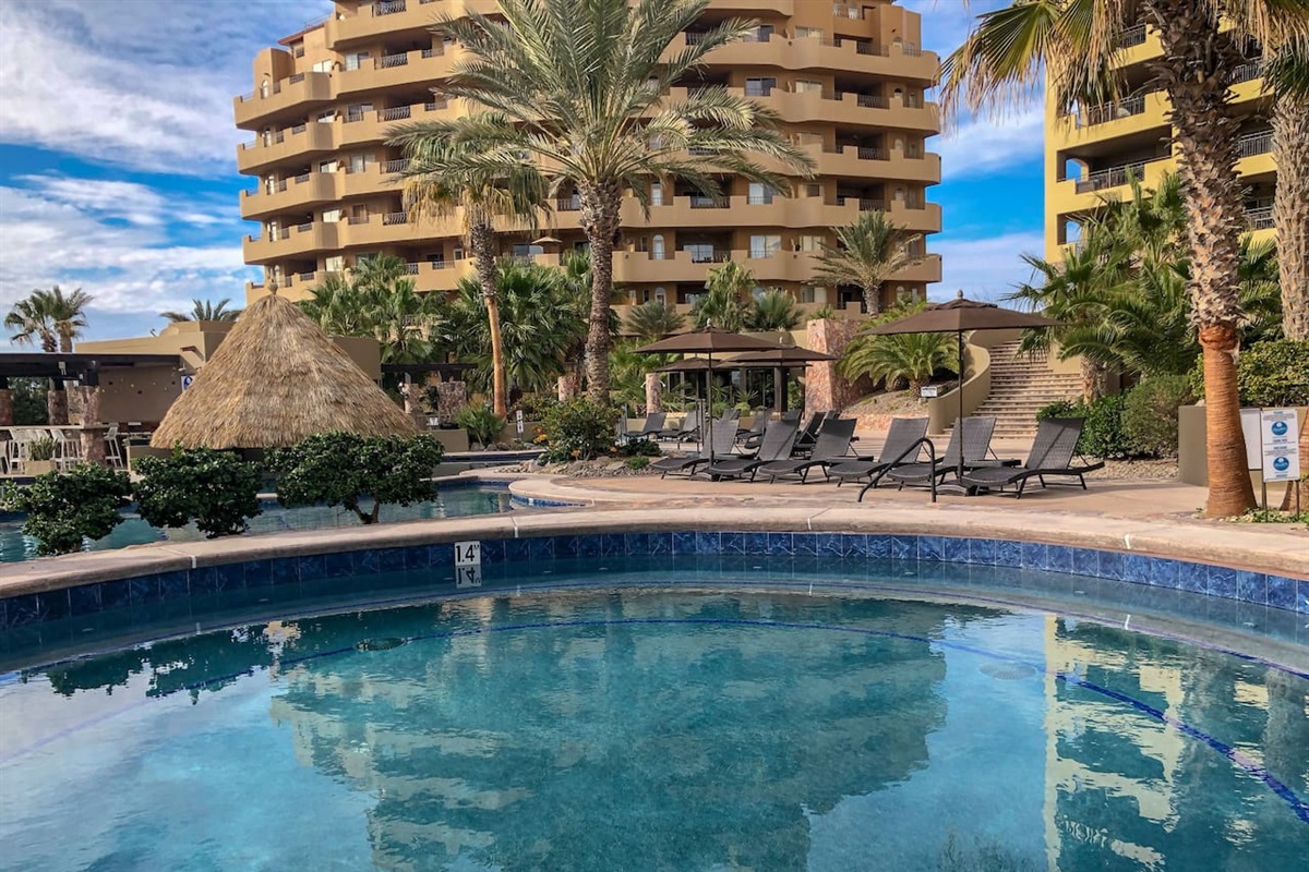 Pool, swim-up bar, and the E building where the condo resides.