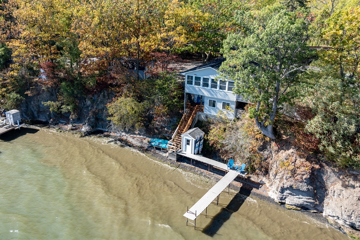 Your private lakeside escape awaits! Enjoy direct water access and beautiful hillside views.