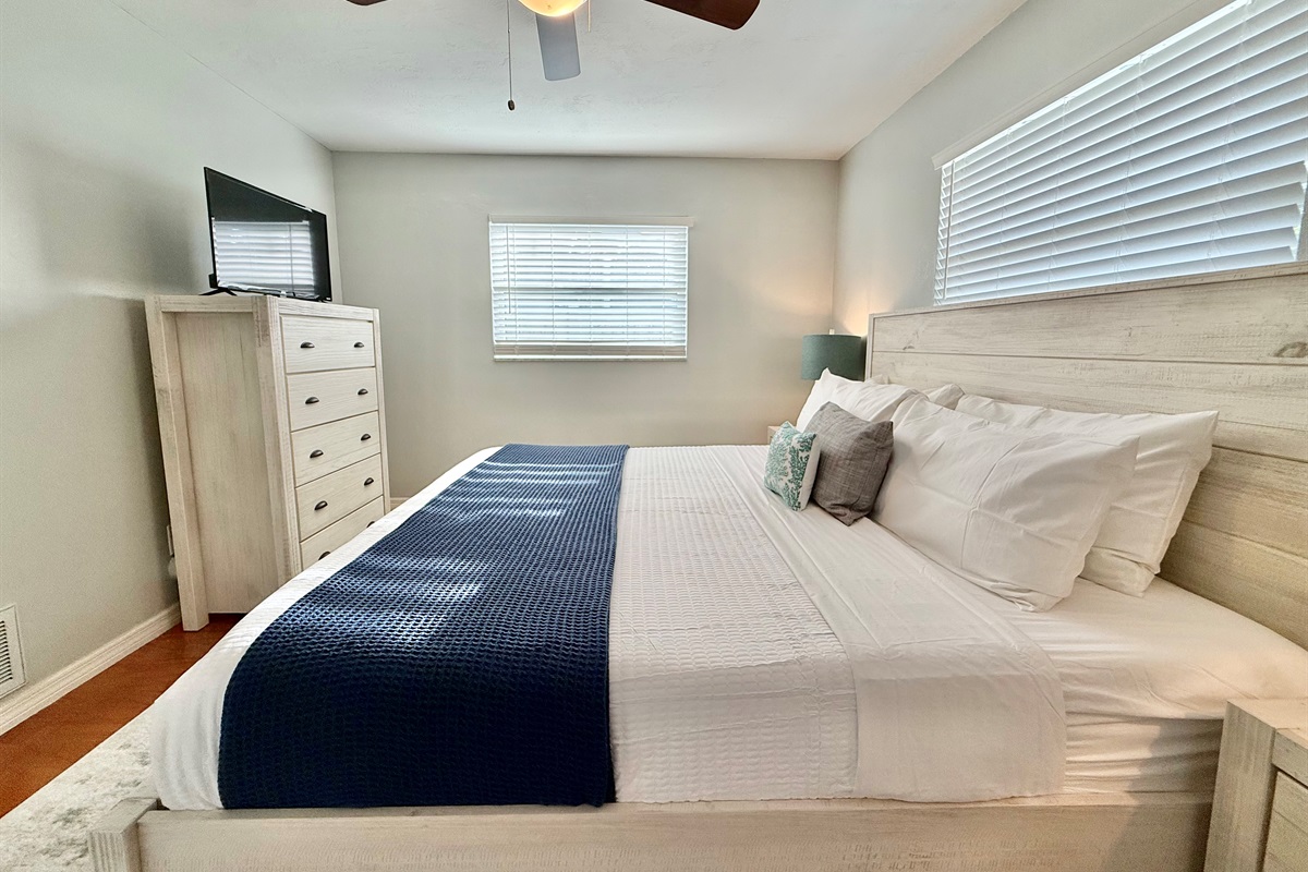 The perfect blend of style and simplicity, this bedroom offers both comfort and charm for restful nights.