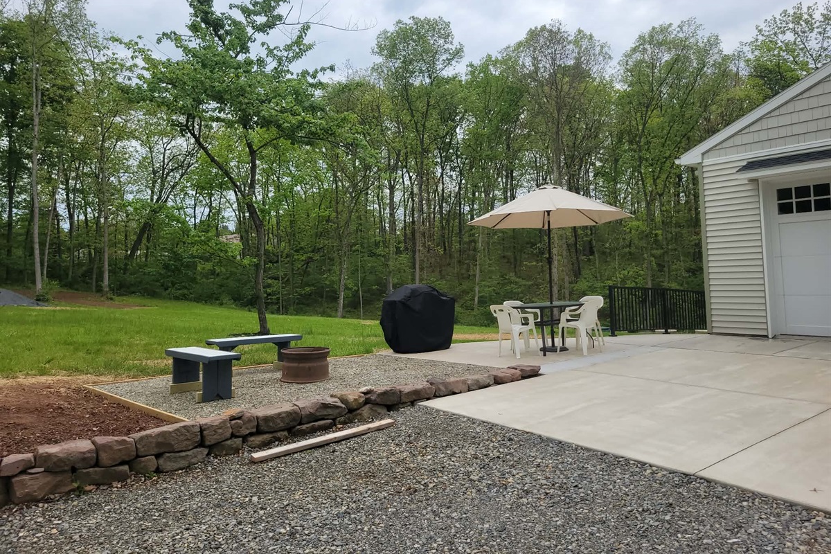 Fire Pit. Wood bundles available for sale at $3 each