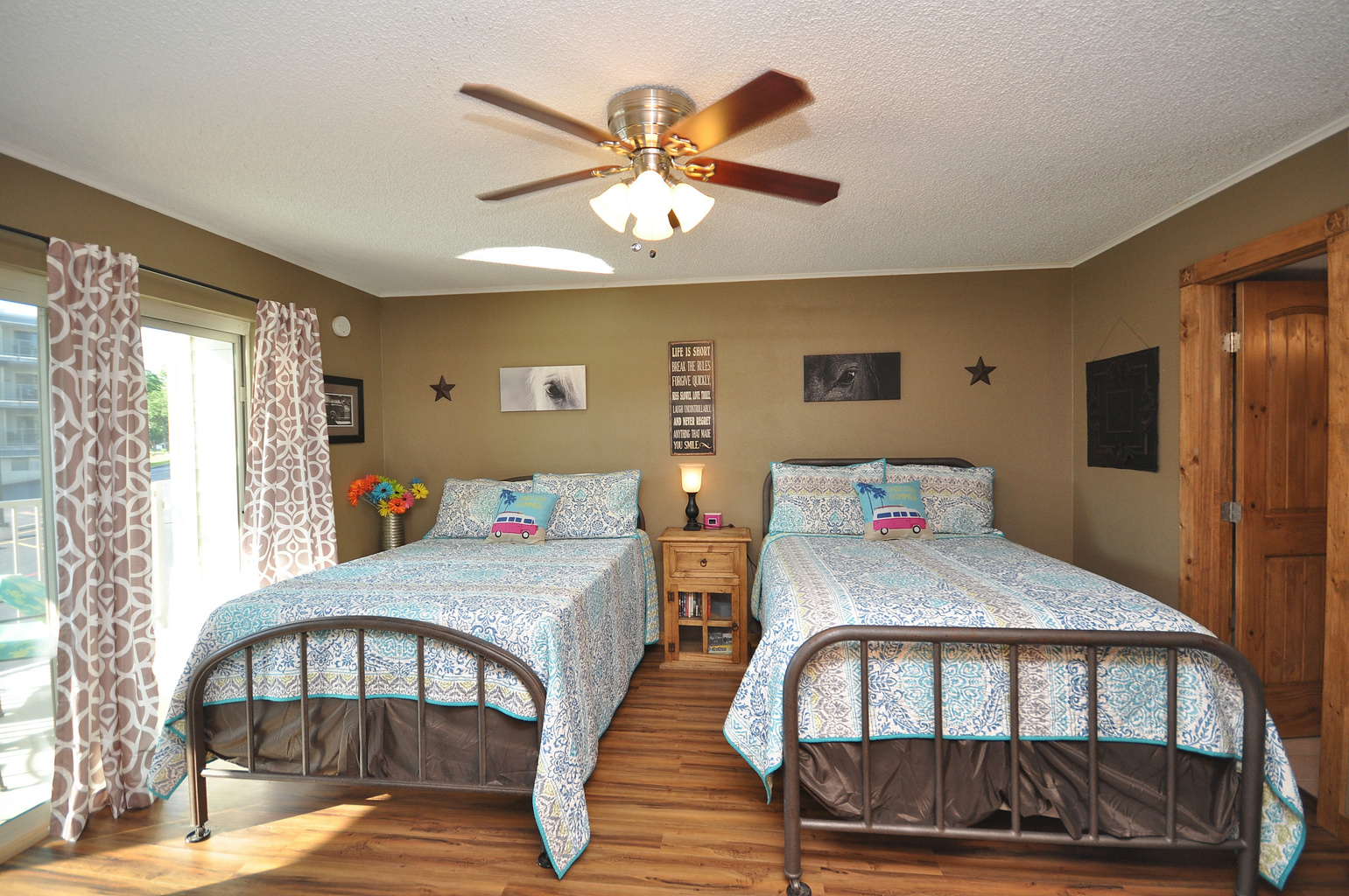 Primary bedroom has two full size beds.