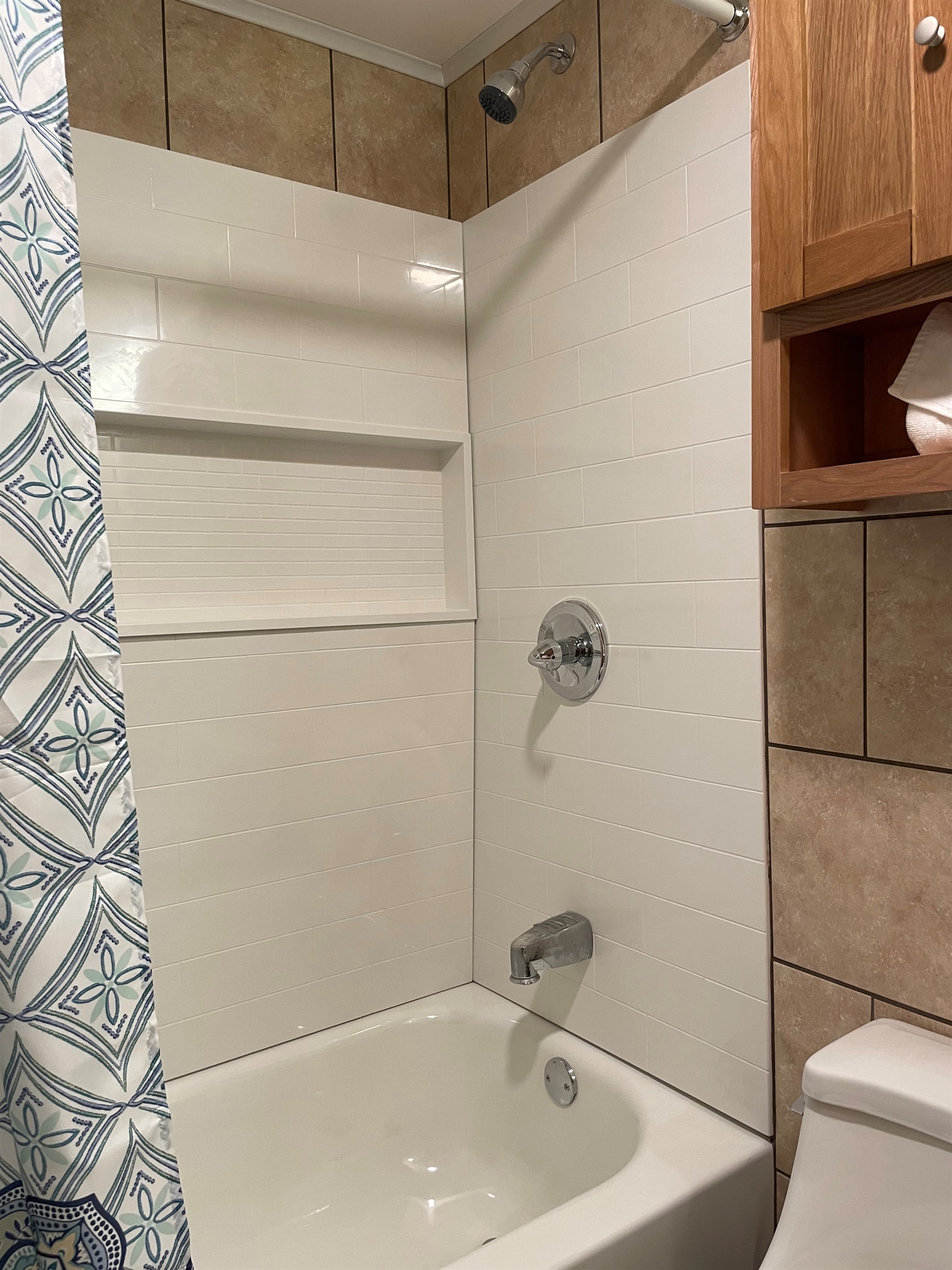 Large shelf in the shower for beauty products