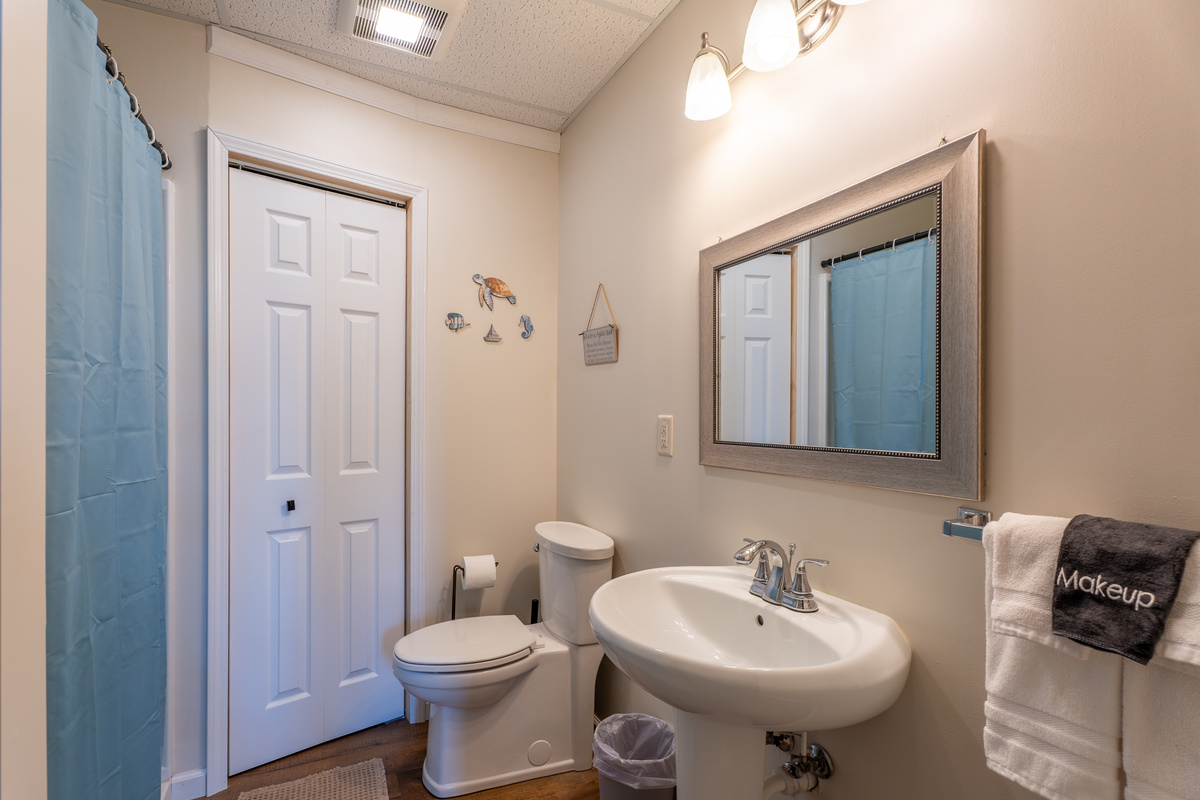 A full en-suite bathroom on the lower level means the game room/hot tub crew never has to come upstairs