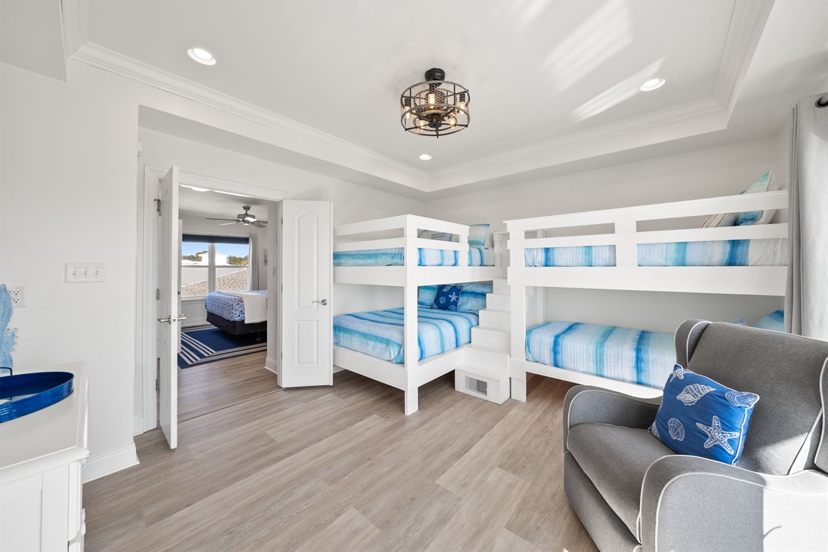 Custom built in bunk beds! With a full/full plus a twin/twin, you can easily sleep 6 in this bunk room. Of course we have a smart tv, ceiling fan, and floor fan for everyone's convenience.