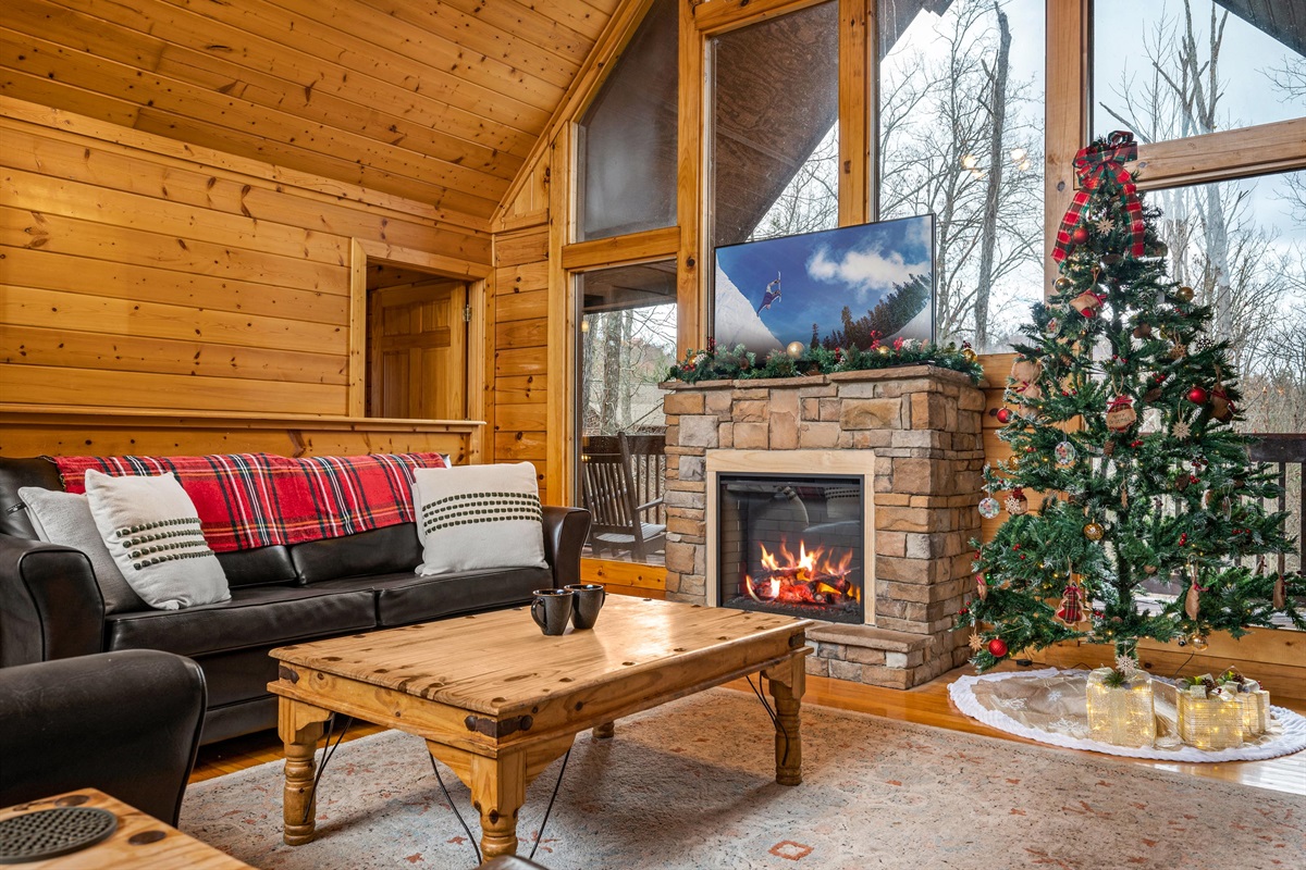 Comfortable leather sofas, great for cozying up by the fireplace, in the upstairs living room.