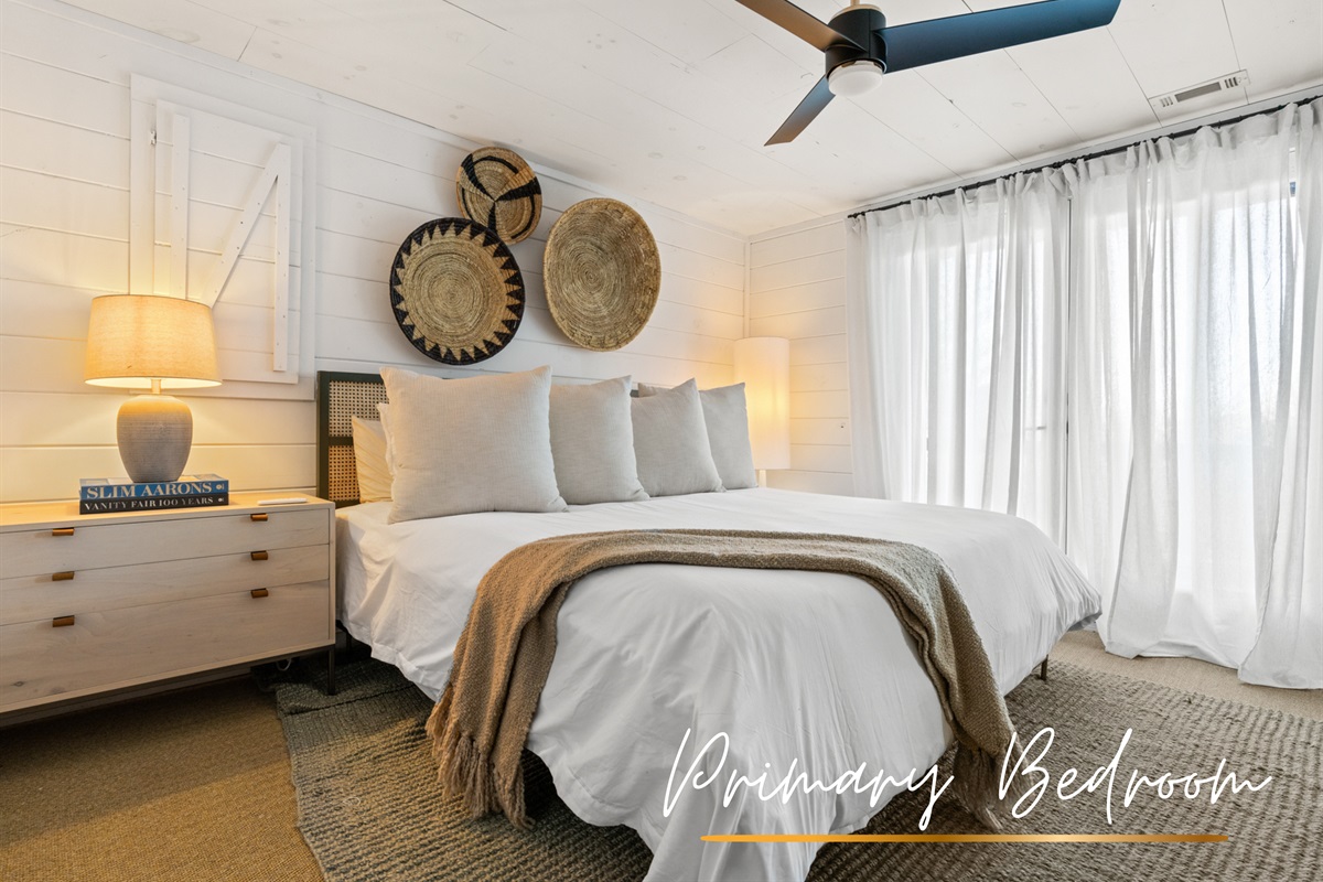 The king bedroom invites you to relax with soft linens, stylish decor, and a peaceful mountain atmosphere.