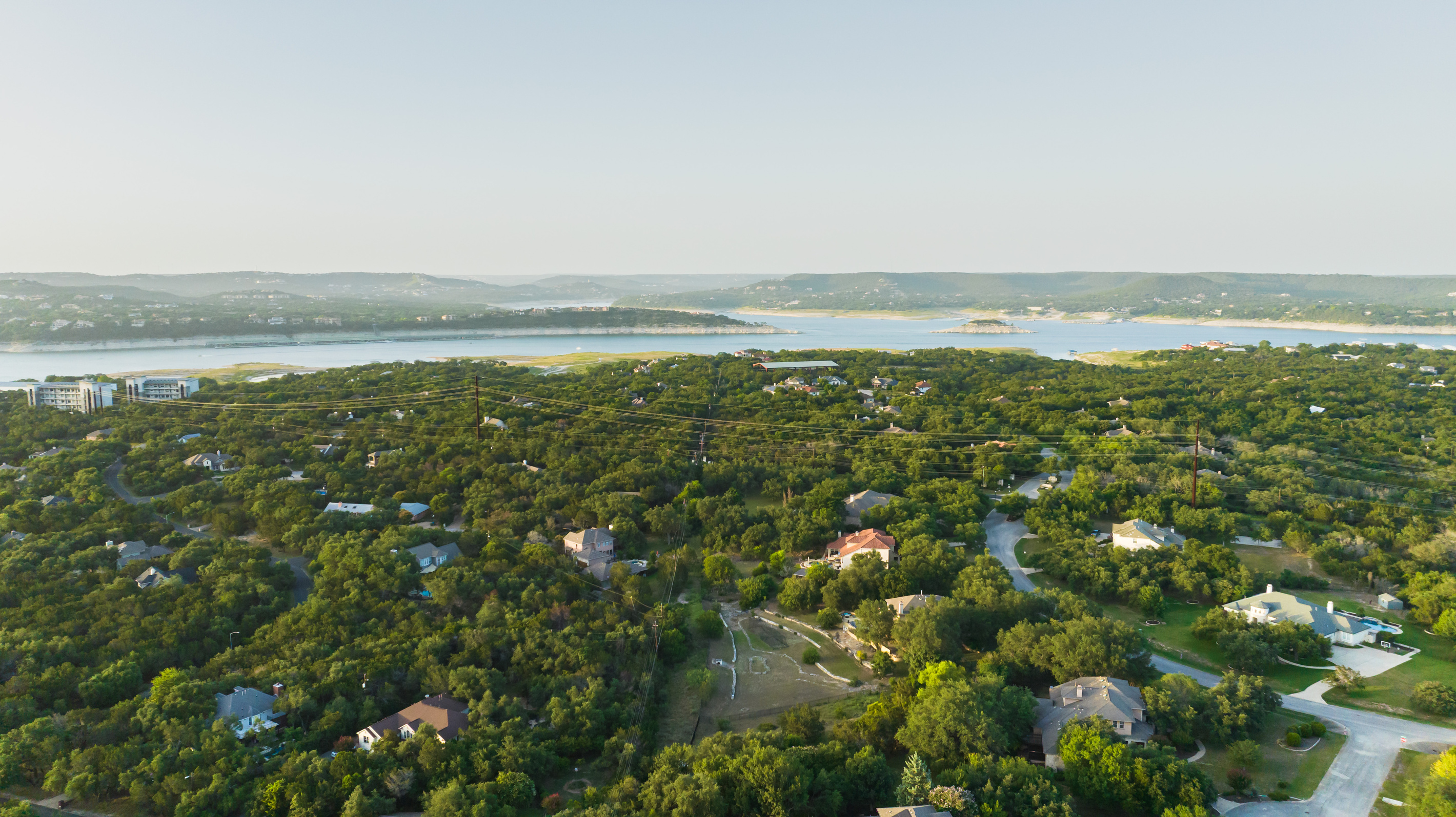 Enjoy the best of the Lake Travis lifestyle from this peaceful Rocky Ridge setting. The home is located near Lake Travis and Paradise Cove Marina, offering a convenient base for boating, lake days, outdoor adventures, dining, and exploring the surrounding 