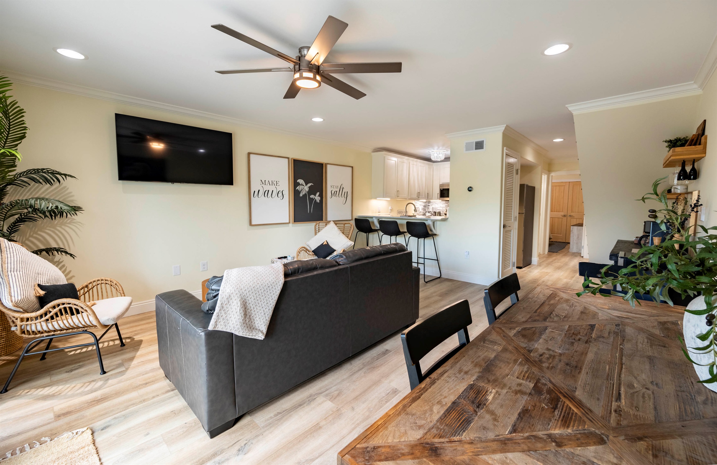 Modern comfort: open living room and kitchen with cozy vibes and natural light.
