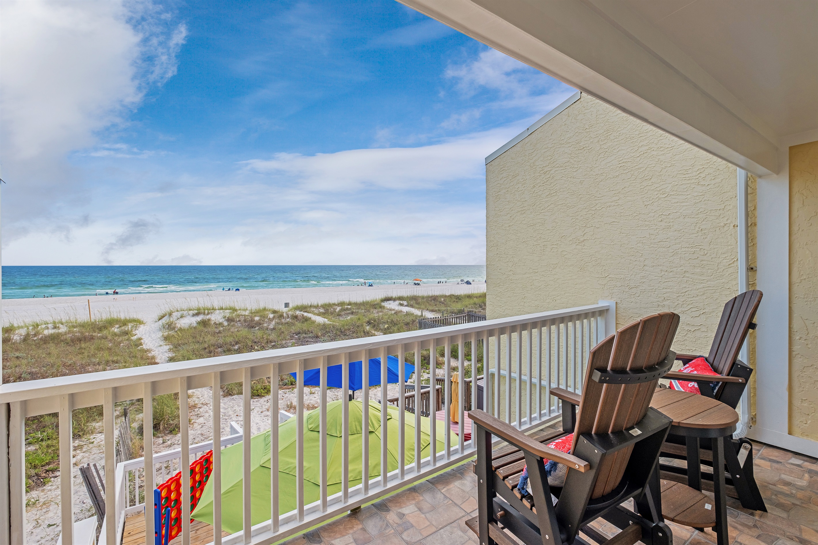 Start your day with a picturesque view from our cozy balcony. With comfortable seating, it's the perfect spot to unwind and take in the tranquil beach scenery.