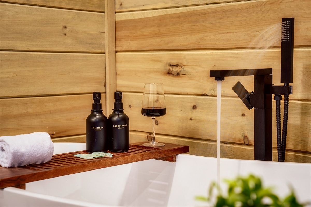 Stylish vanity area with great lighting. Easy mornings start here.