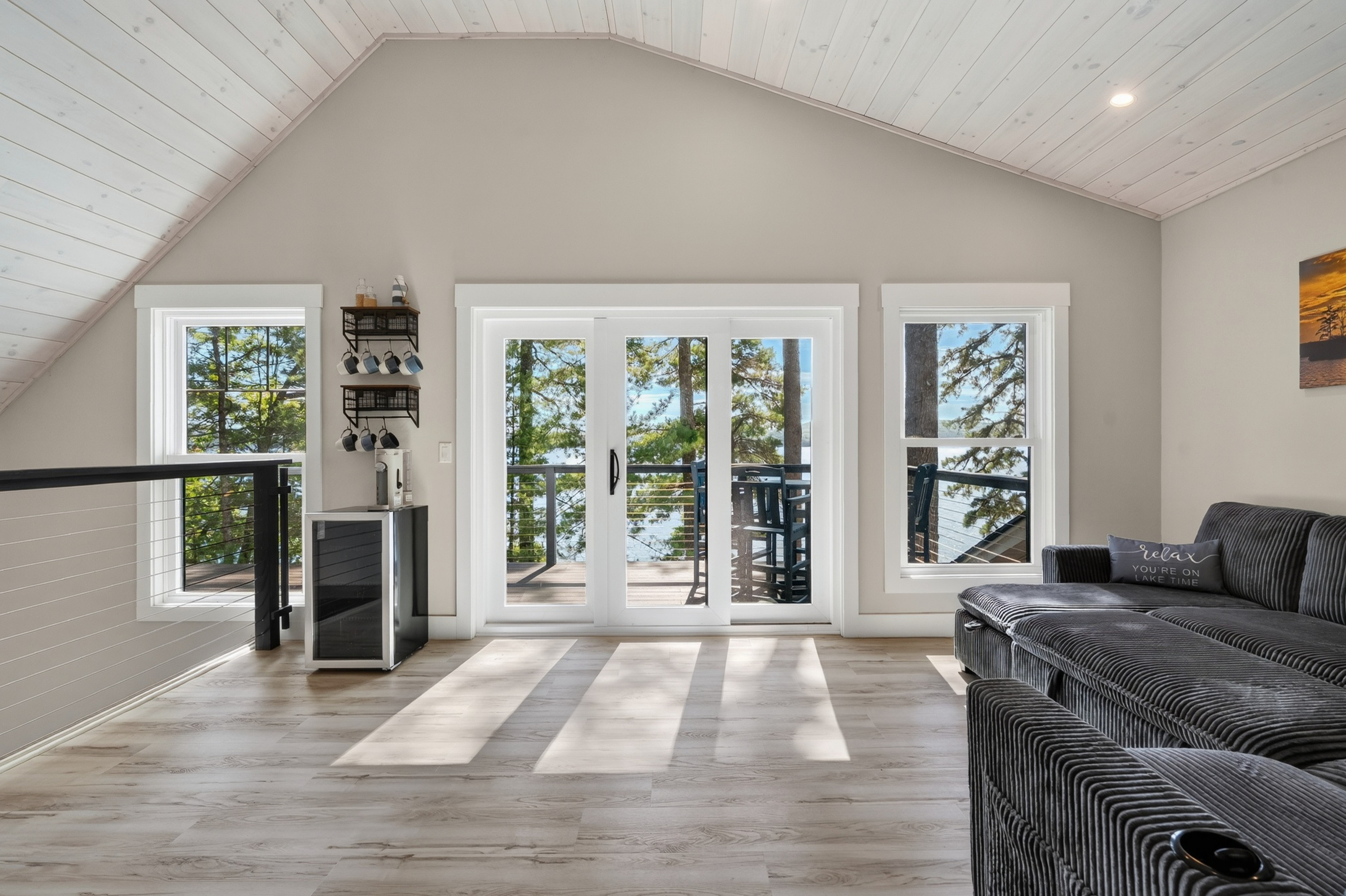 A quiet upstairs escape for coffee, conversation, reading, or simply staring at the lake for a while.