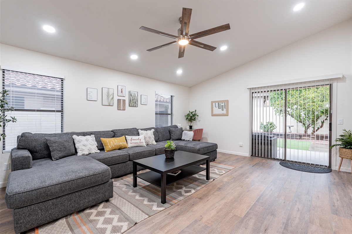 Main room with large with sliding door to backyard.