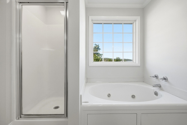 Separate shower + jetted tub for a little post-lake relaxing.