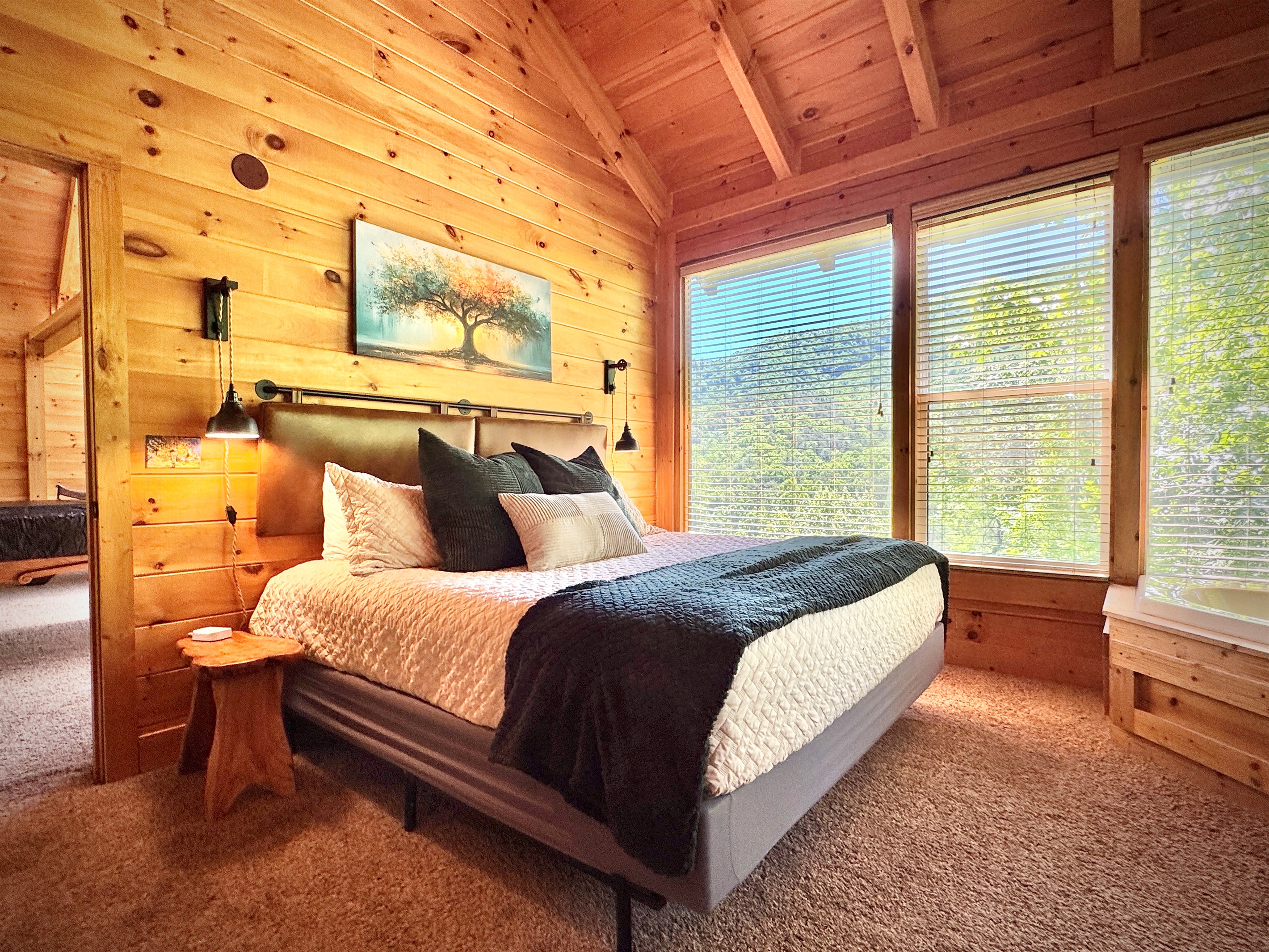 Room #4, Treehouse room, king, upstairs, tub, private bathroom, fireplace and TV.