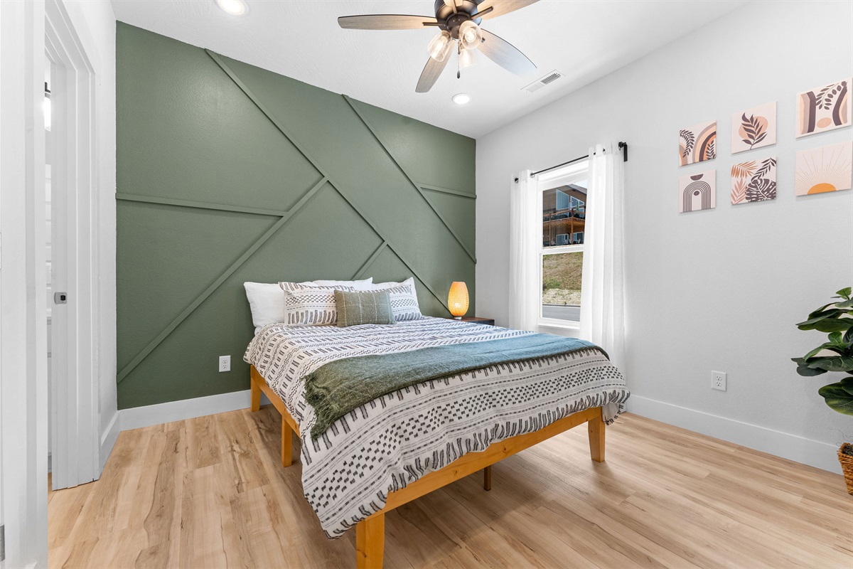 Main level king bedroom w/ ensuite bath