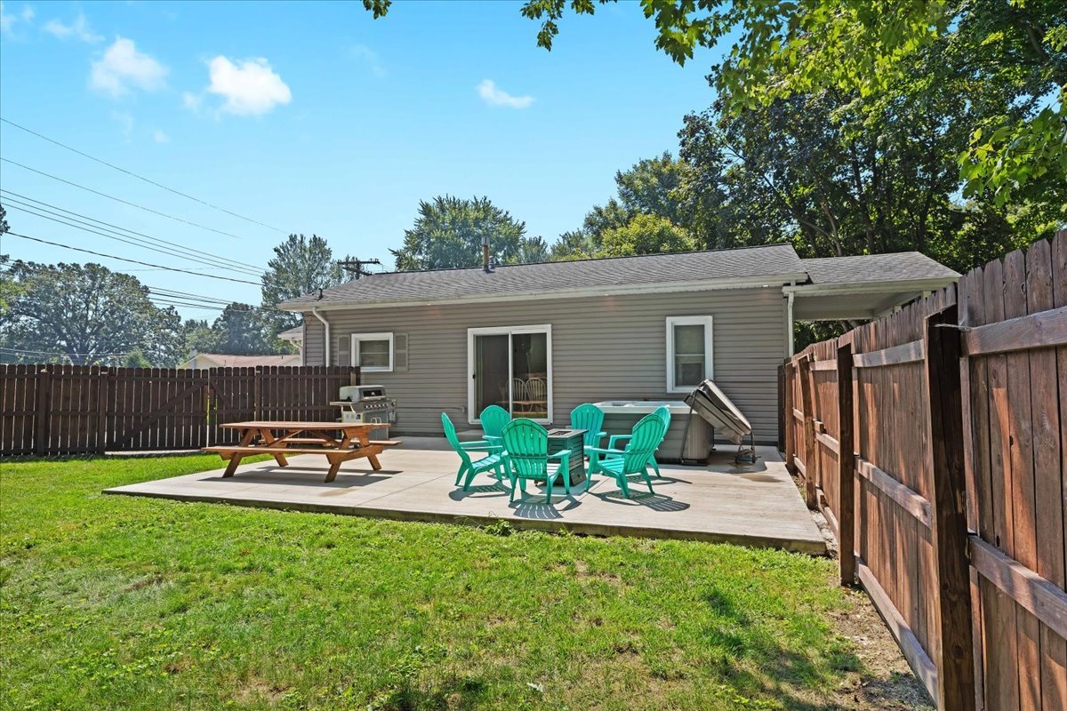 Expansive yard with seating for group gatherings