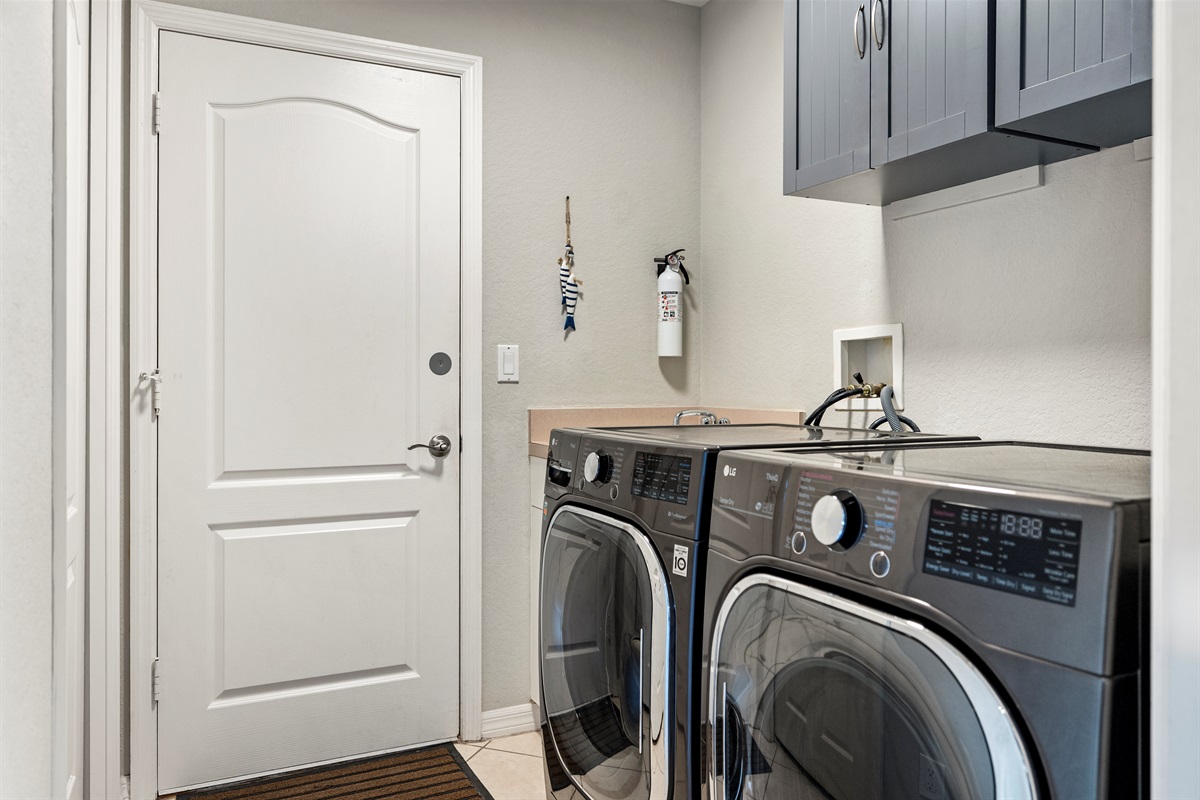 Laundry made easy with high-efficiency LG washer and dryer, plus extra storage
