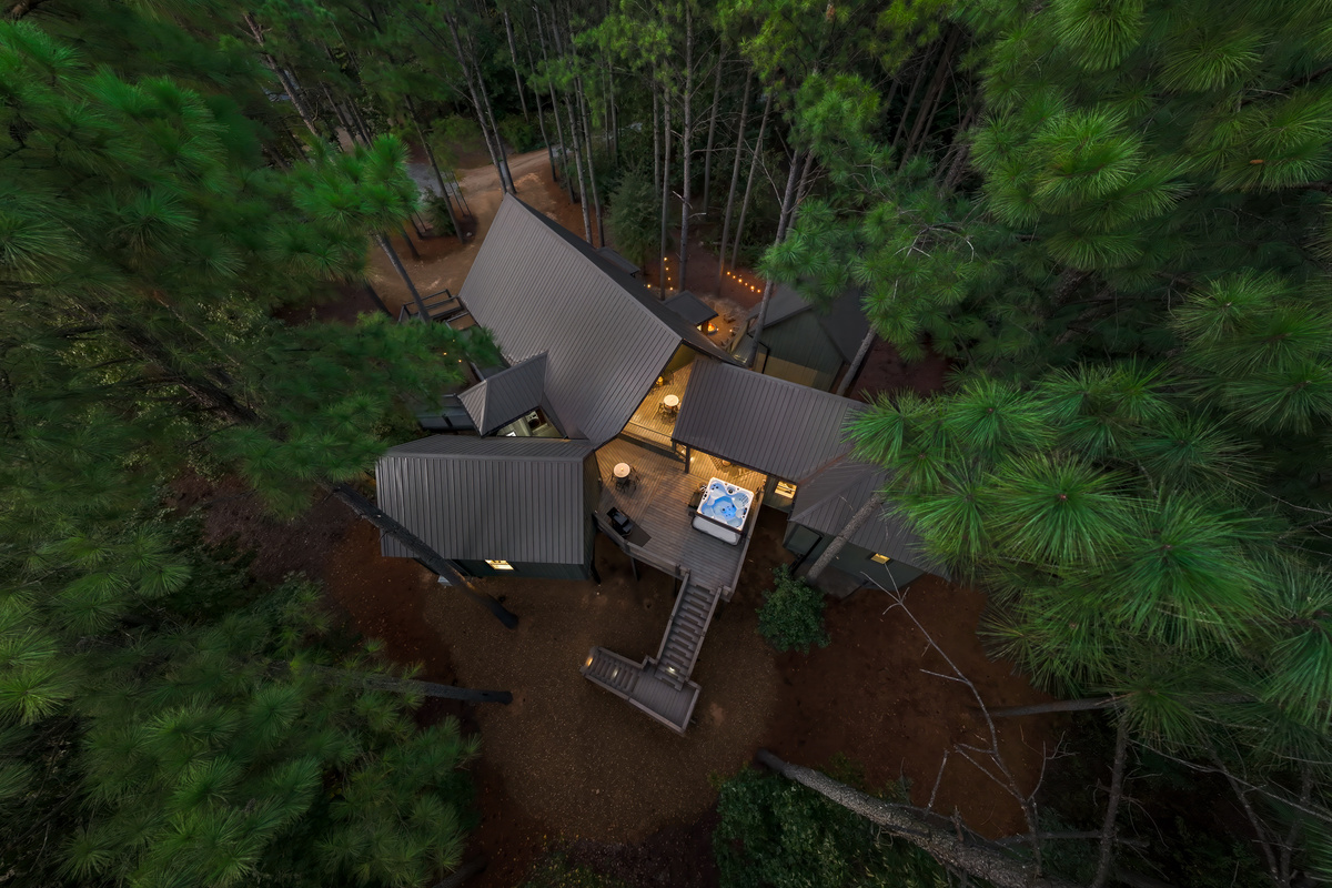 From above, High Life’s one-of-a-kind design comes into focus — separate private pods connected through the trees, surrounded by the pines of Hochatown.
