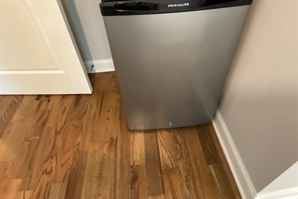 Small refrigerator in all of the main bedrooms. Look in the walk in closets if you can't find it out in the open.