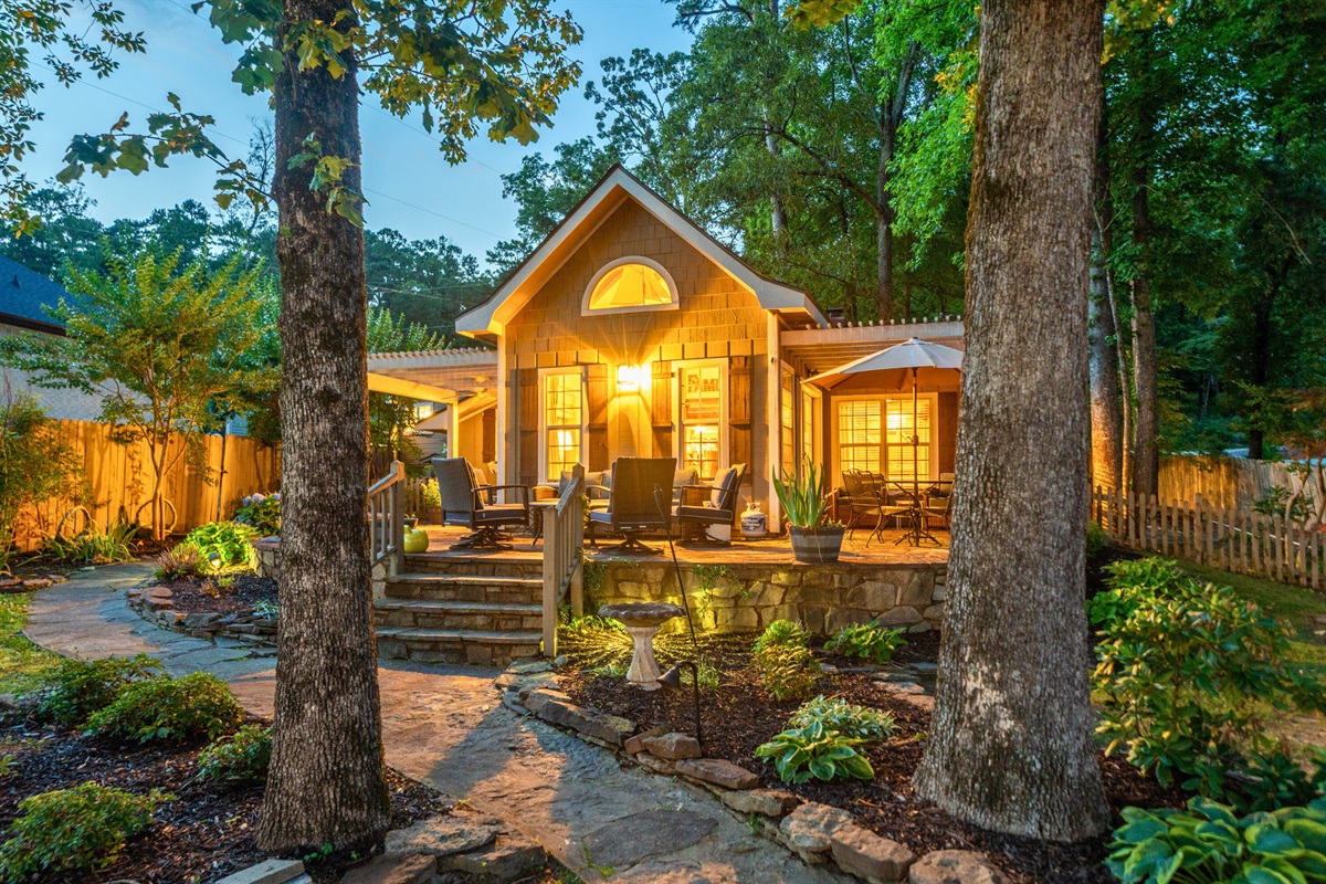 A garden path winds through the trees and leads you home. Every detail of this retreat is lovingly curated for peace and charm.