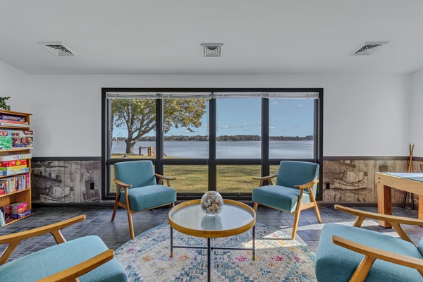 Leave the TVs behind to reconnect with loved ones in the sunroom - or just enjoy the view!