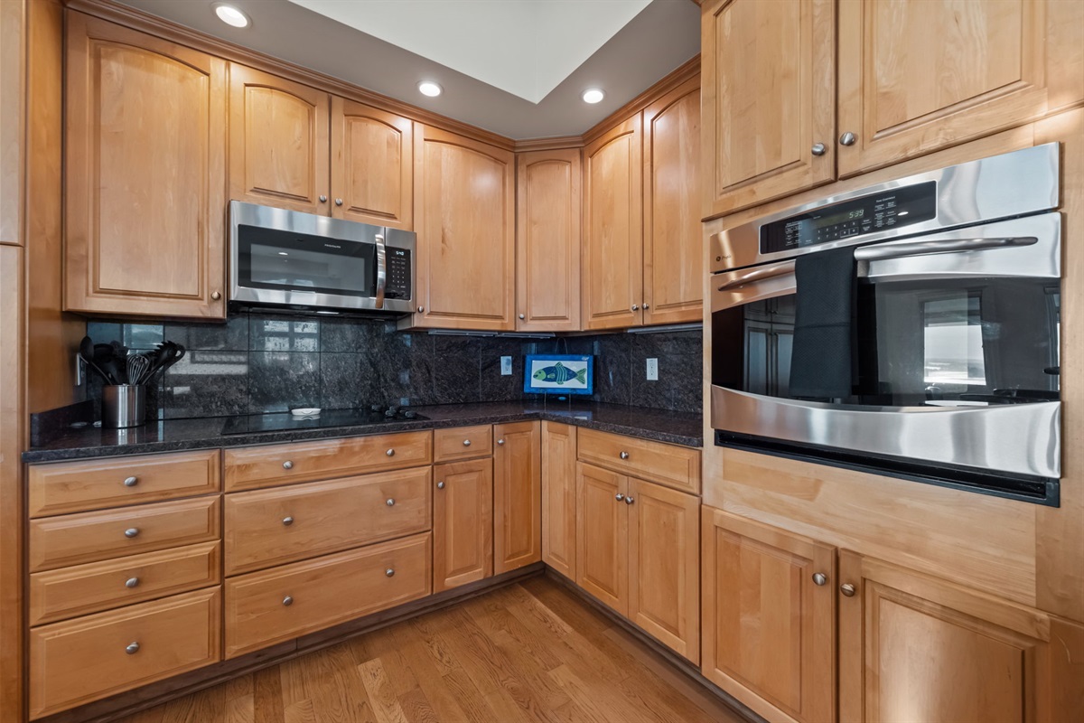 Well-equipped kitchen with ample counter space, cabinetry, and modern appliances for easy cooking