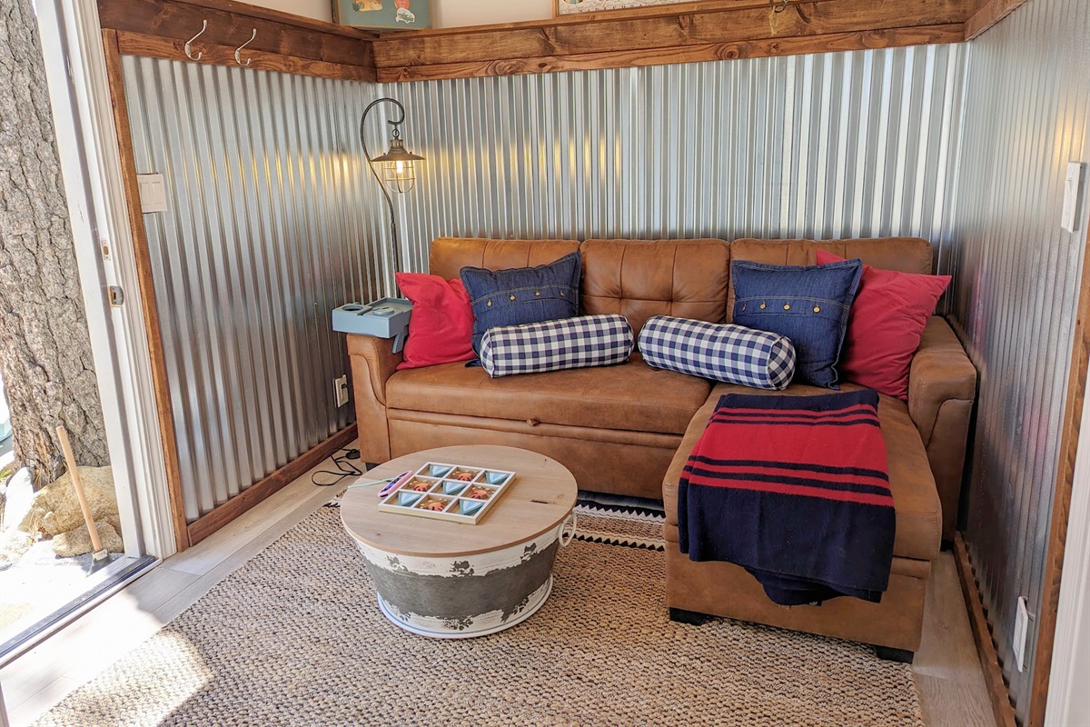 The small sectional fold up so that you can spread out your legs or use it as a small but firm bed that is probably best for kids.
