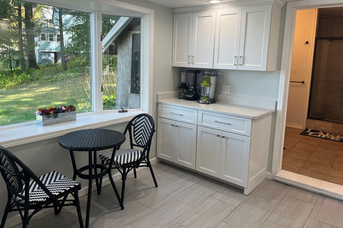 Breakfast nook and 1st floor bath beyond