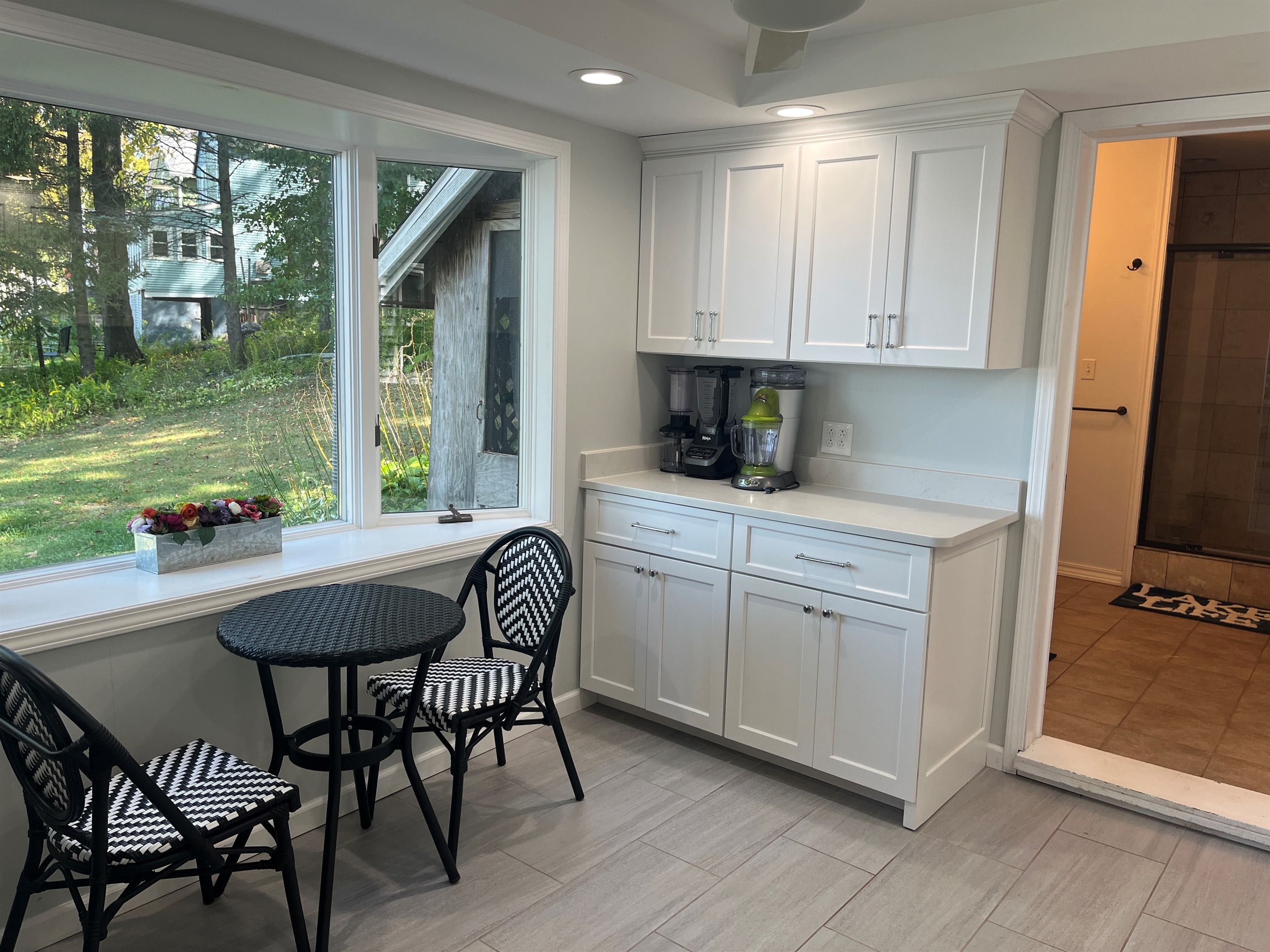 Breakfast nook and 1st floor bath beyond