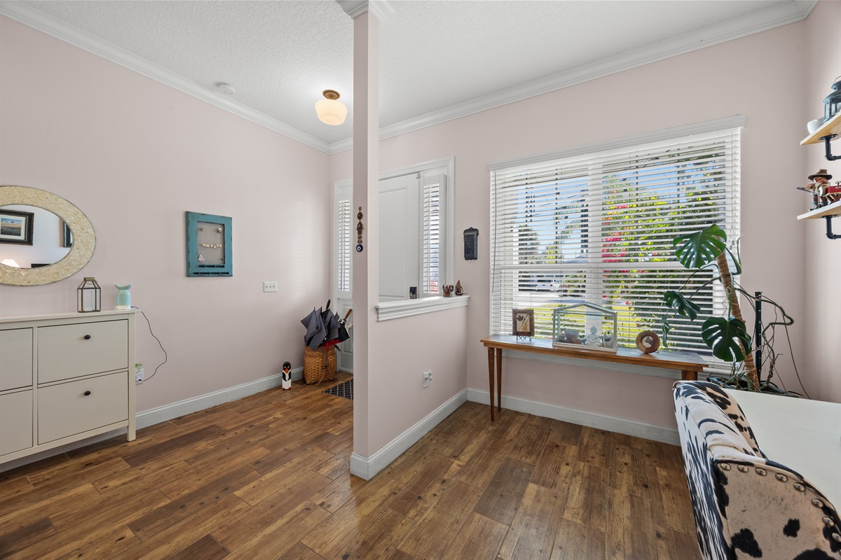 Inviting entry with warm décor — a cozy welcome to your beach home.