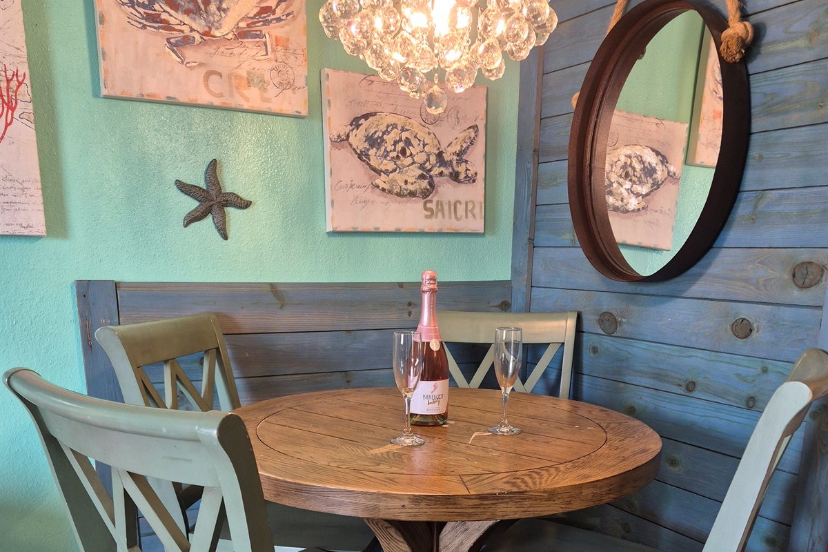 Sweet dining corner with seating for 4 (there's a barstool at the bar you can pull over as well)