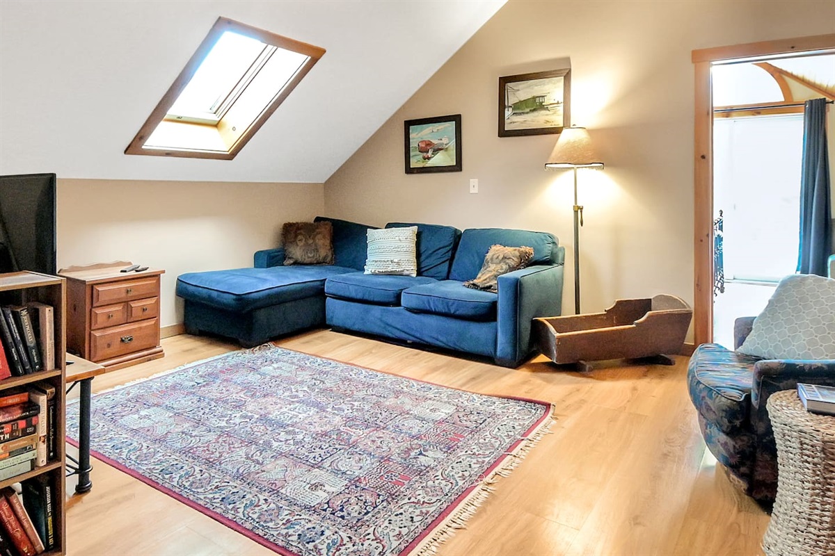 Sit down and play some games in the second floor living room of the main home after a long day! 