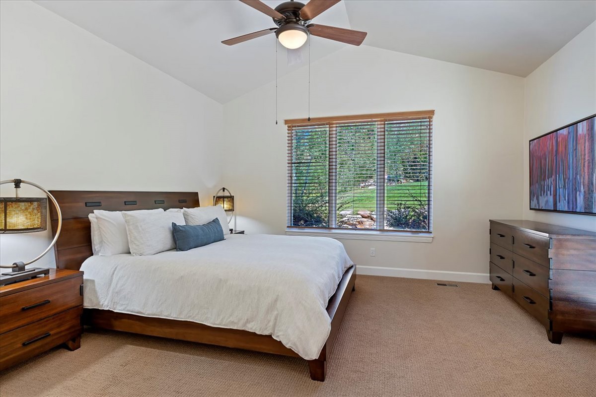 Drift off in a peaceful primary suite designed for rest, comfort, and a great night’s sleep after a full day of fun.