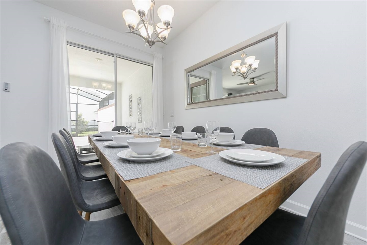 The big dining table has seating space for up to 10 guests
