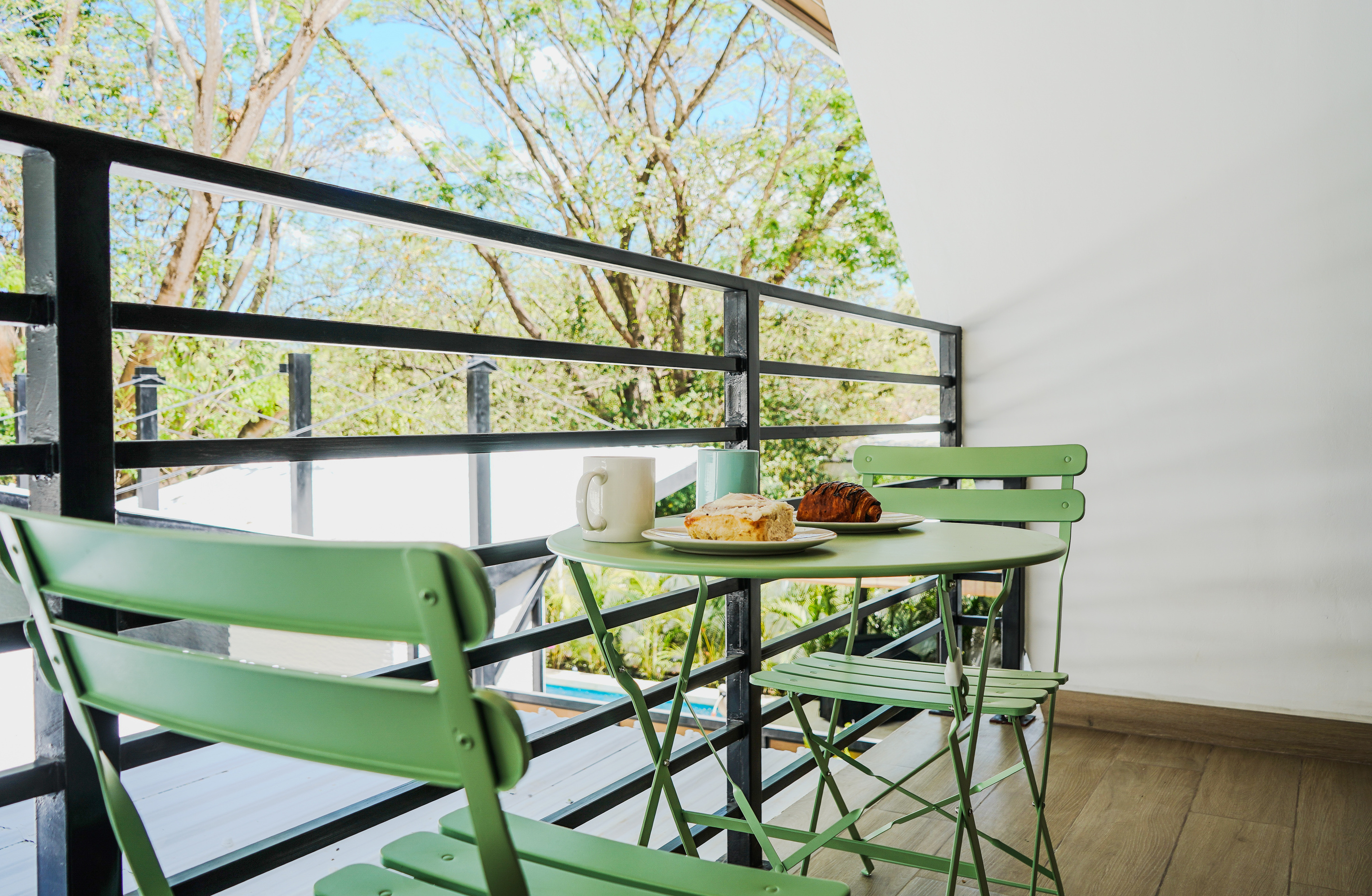 Private balcony. Morning coffee and pastries