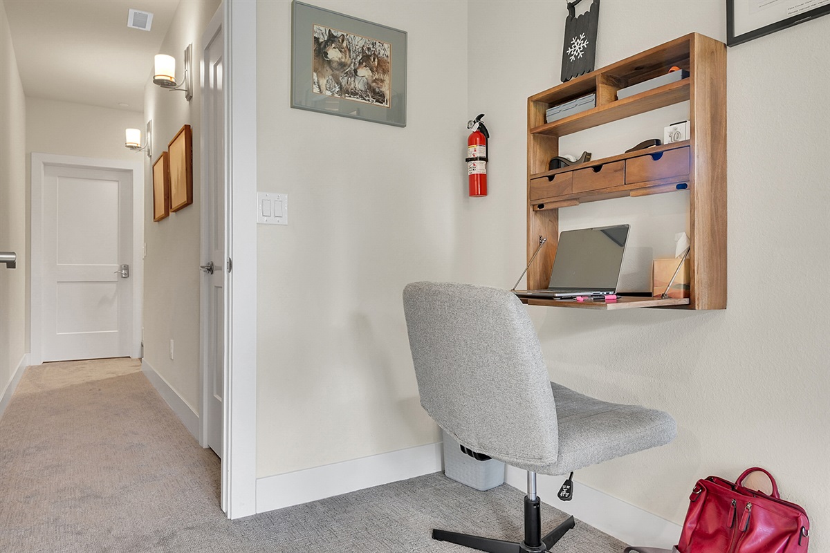 Work area in Bunk Room, boosted wifi is adjacent to the desk