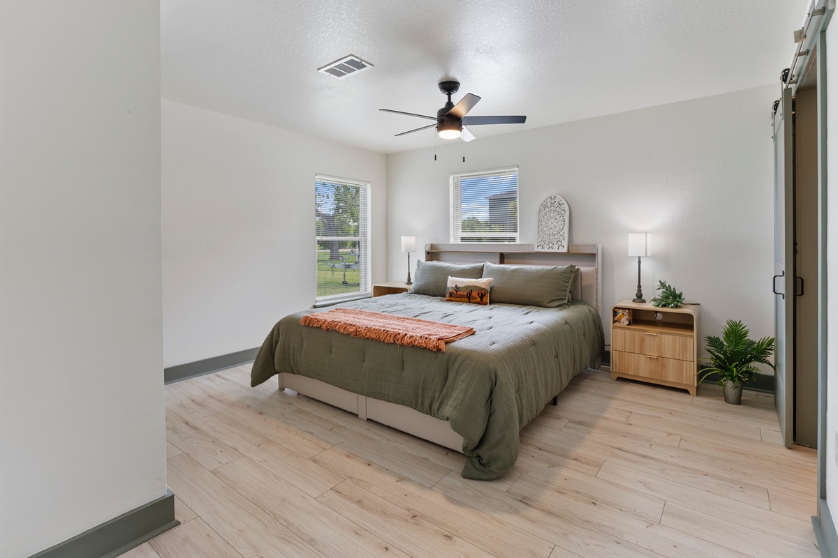 Primary Bedroom with a king size bed and ensuite bathroom